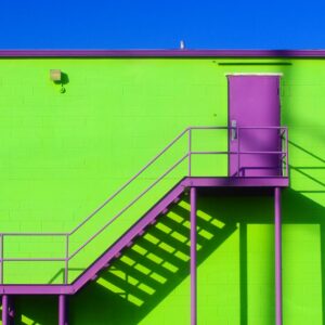 art photo of green wall with purple stairs