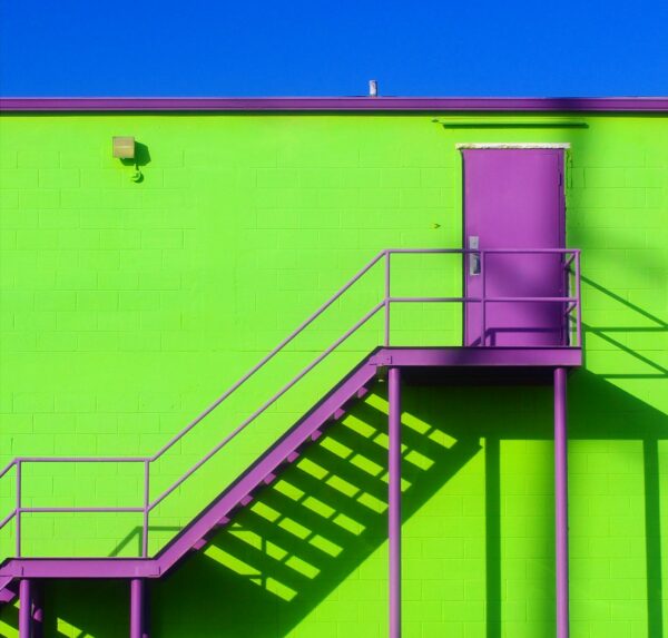 Green wall with purple stairs