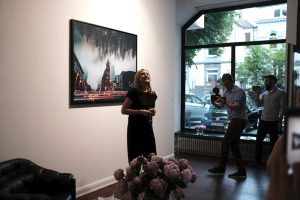 Anna Stoffel holding a speech in her Social Media Art Gallery