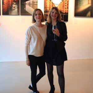 guest and Anna Stoffel at gallery event