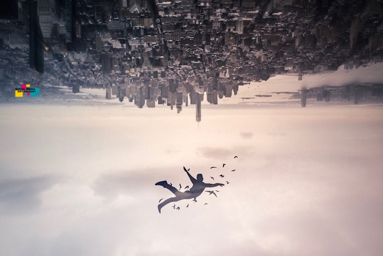flying person over new york skyline upside down surrounded by flying birds